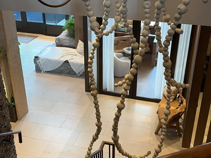 The planted lobby at 1 Hotel, with seating among the greenery