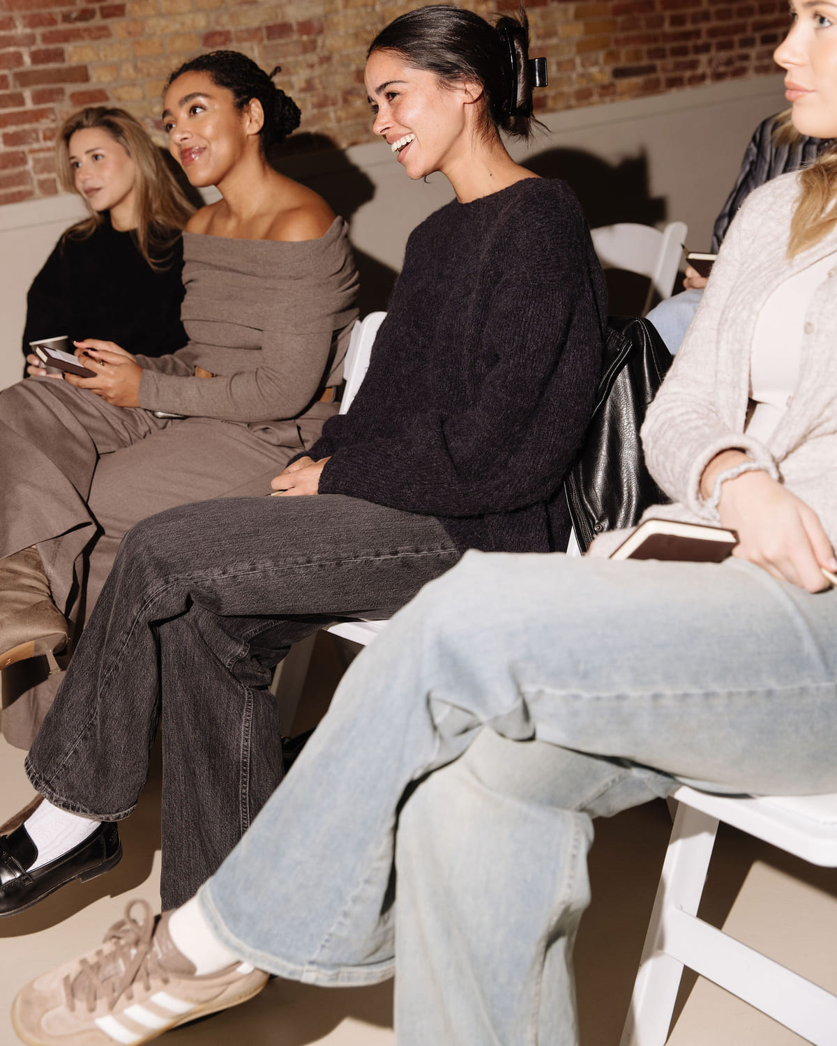 Guests laughing during a talk